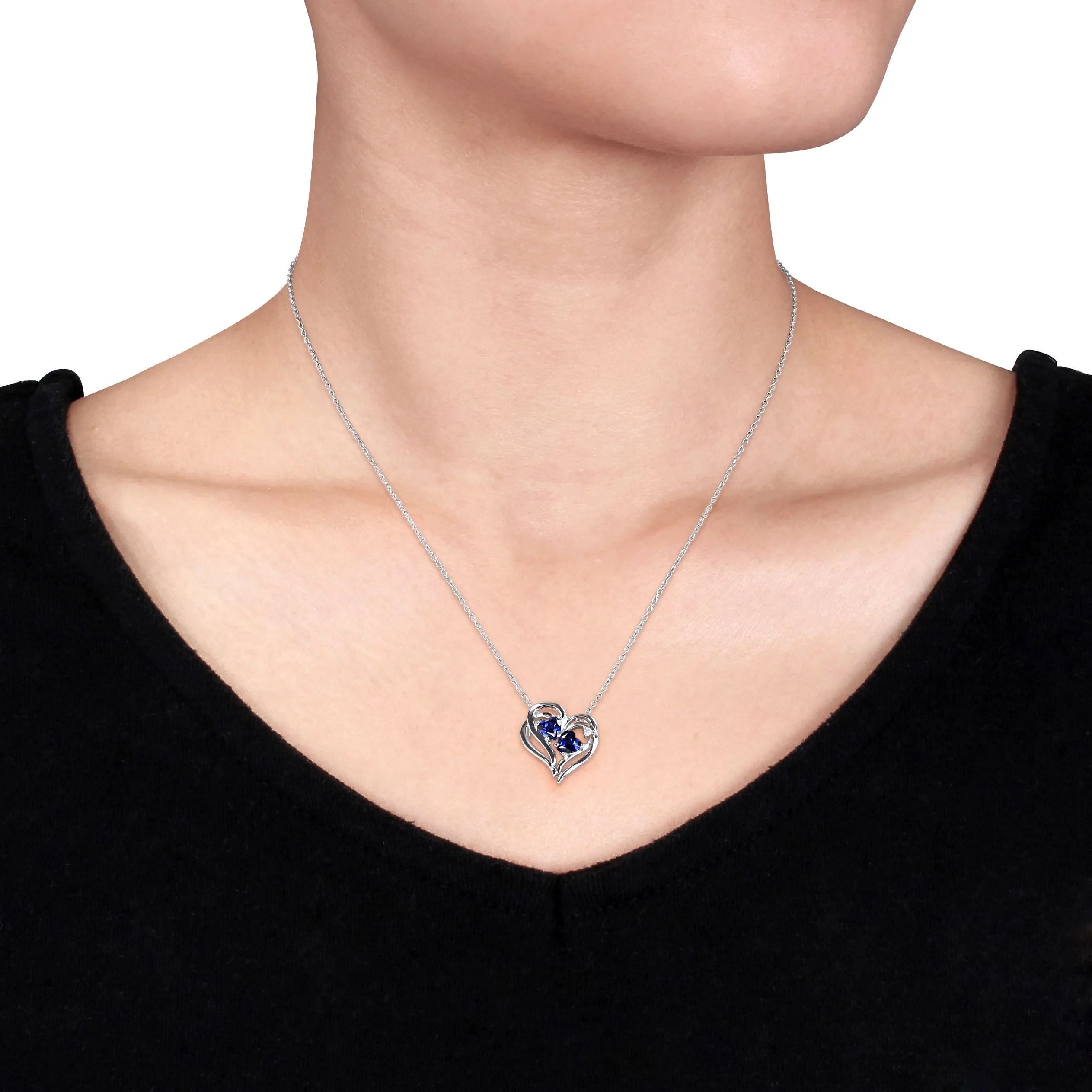 1 1/8 CT TGW Created Blue Sapphire Heart and 0.02 CT TW Diamond Pendant with Chain in Sterling Silver