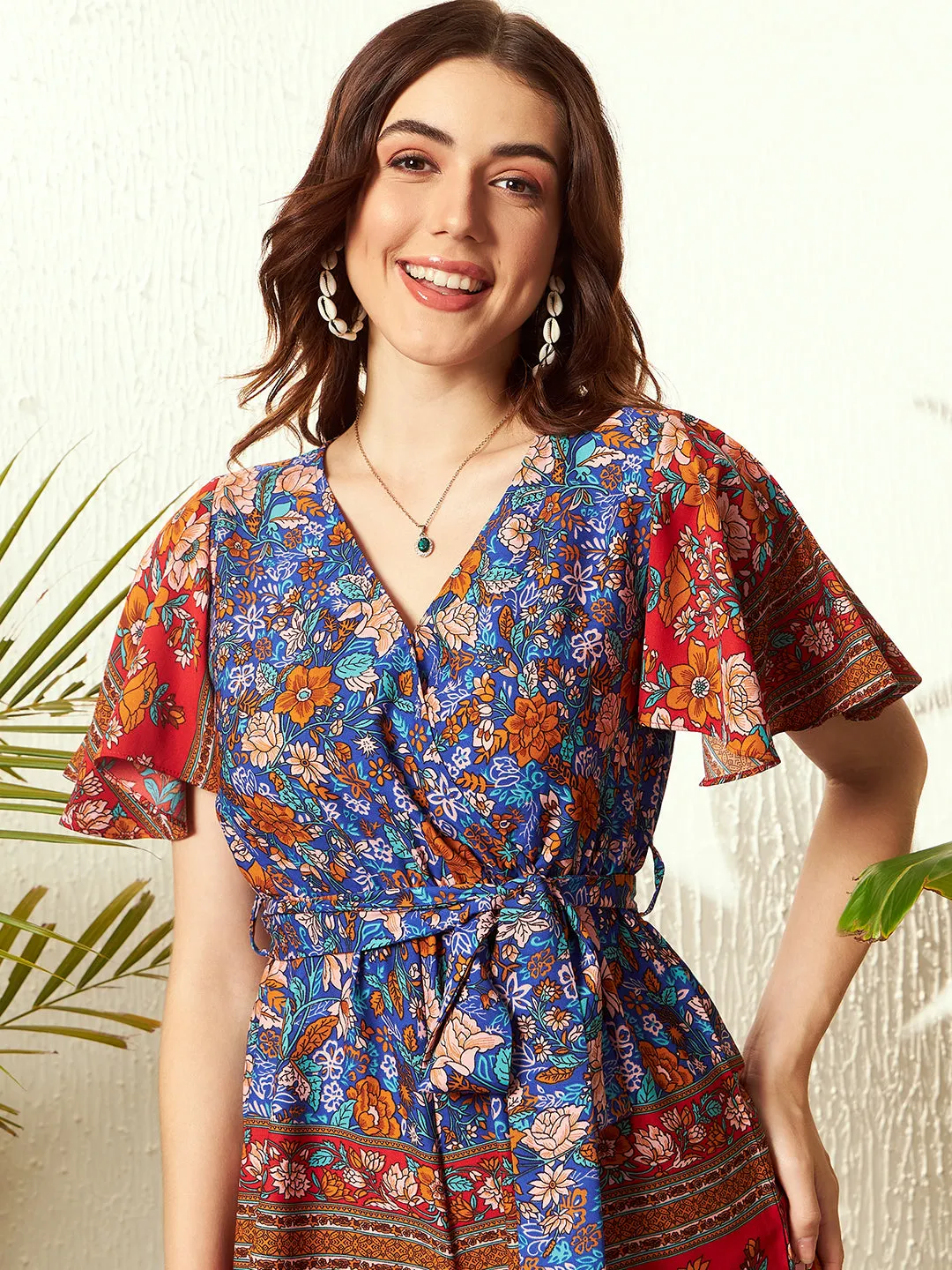 Berrylush Women Blue & Orange Floral Printed V-Neck Flutter Sleeve Waist Tie-Up Pleated Mini Playsuit