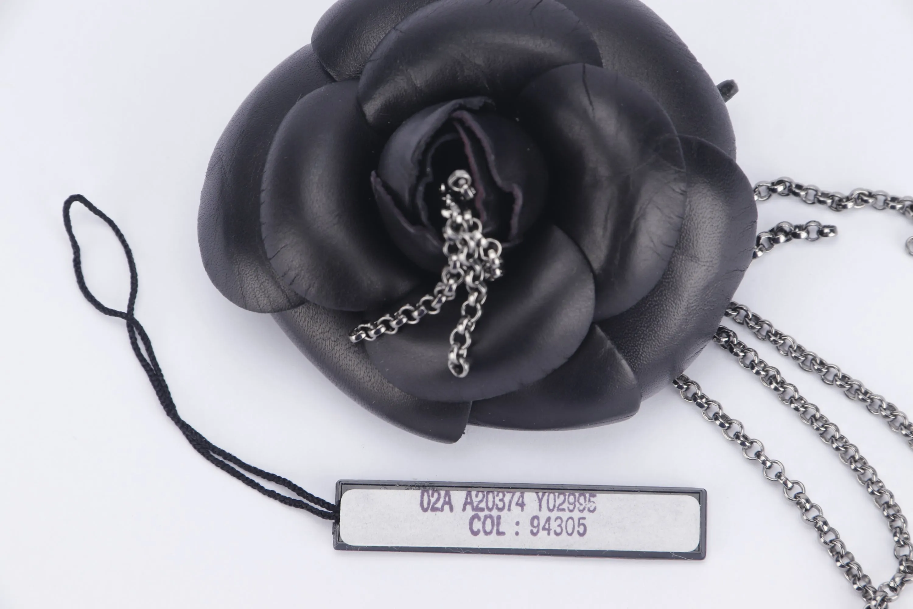 CHANEL A20374 BLACK LEATHER WITH FRINGE CAMELIA BROOCH, WITH BOX