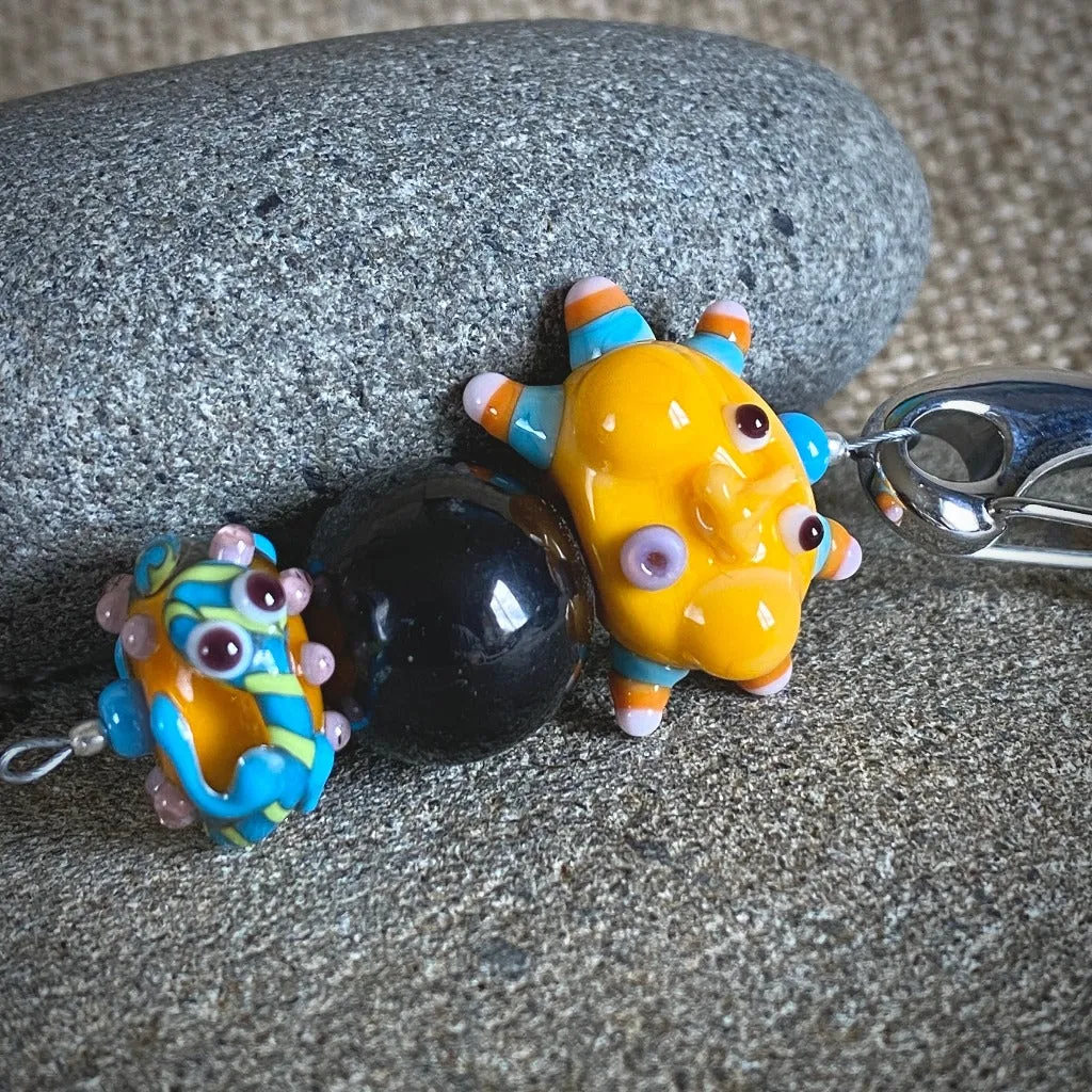 Shungite Clip-on, Necklace, Whimsical Orange Sun Face, Lampwork Glass